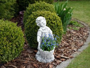 Bac à fleur forme garçon en GRC